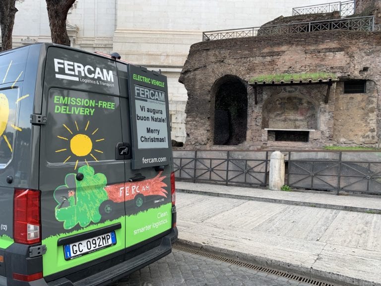 Truckscreenia van next to historical landmark in Rome